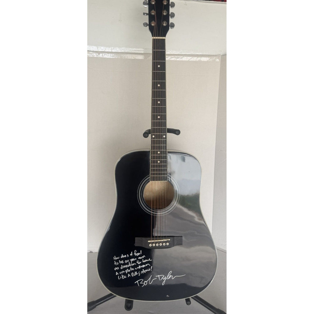 Bob Dylan acoustic guitar signed with lyrics and signing proof.