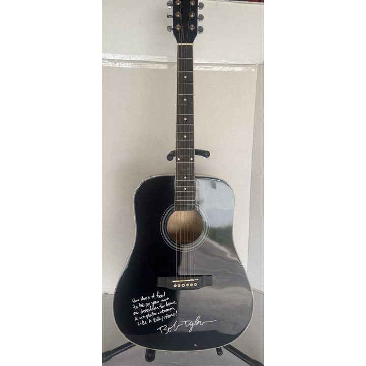 Bob Dylan acoustic guitar signed with lyrics and signing proof.