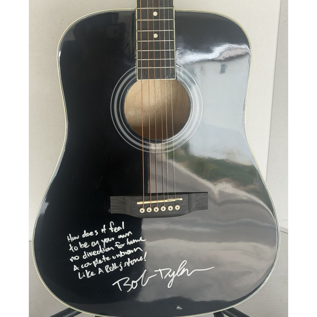 Bob Dylan acoustic guitar signed with lyrics and signing proof.