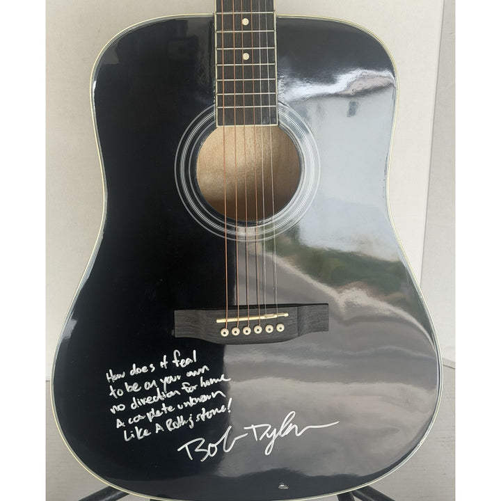 Bob Dylan acoustic guitar signed with lyrics and signing proof.