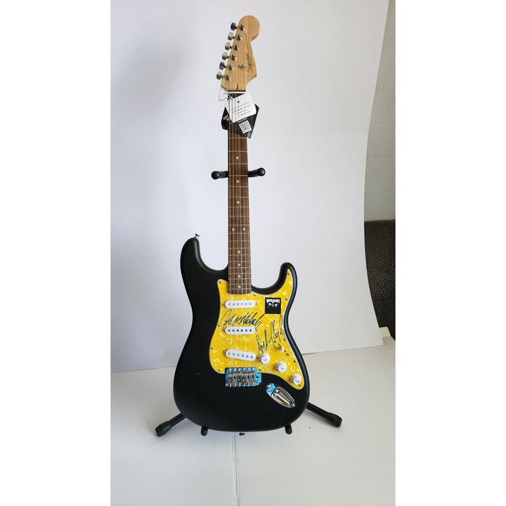 George Michael & Andrew Ridgeley Wham genuine Fender Stratocaster electric guitar signed with proof