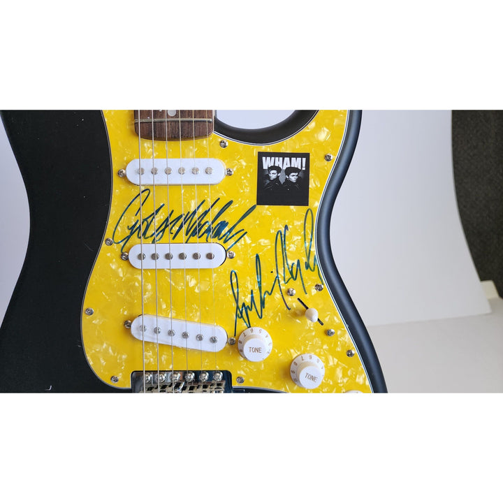 George Michael & Andrew Ridgeley Wham genuine Fender Stratocaster electric guitar signed with proof