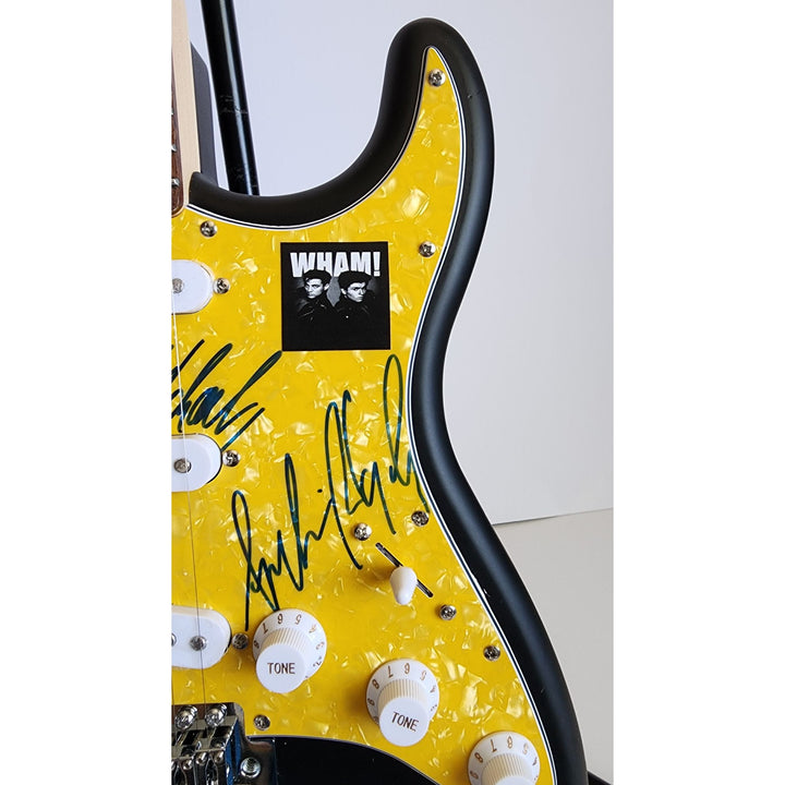 George Michael & Andrew Ridgeley Wham genuine Fender Stratocaster electric guitar signed with proof
