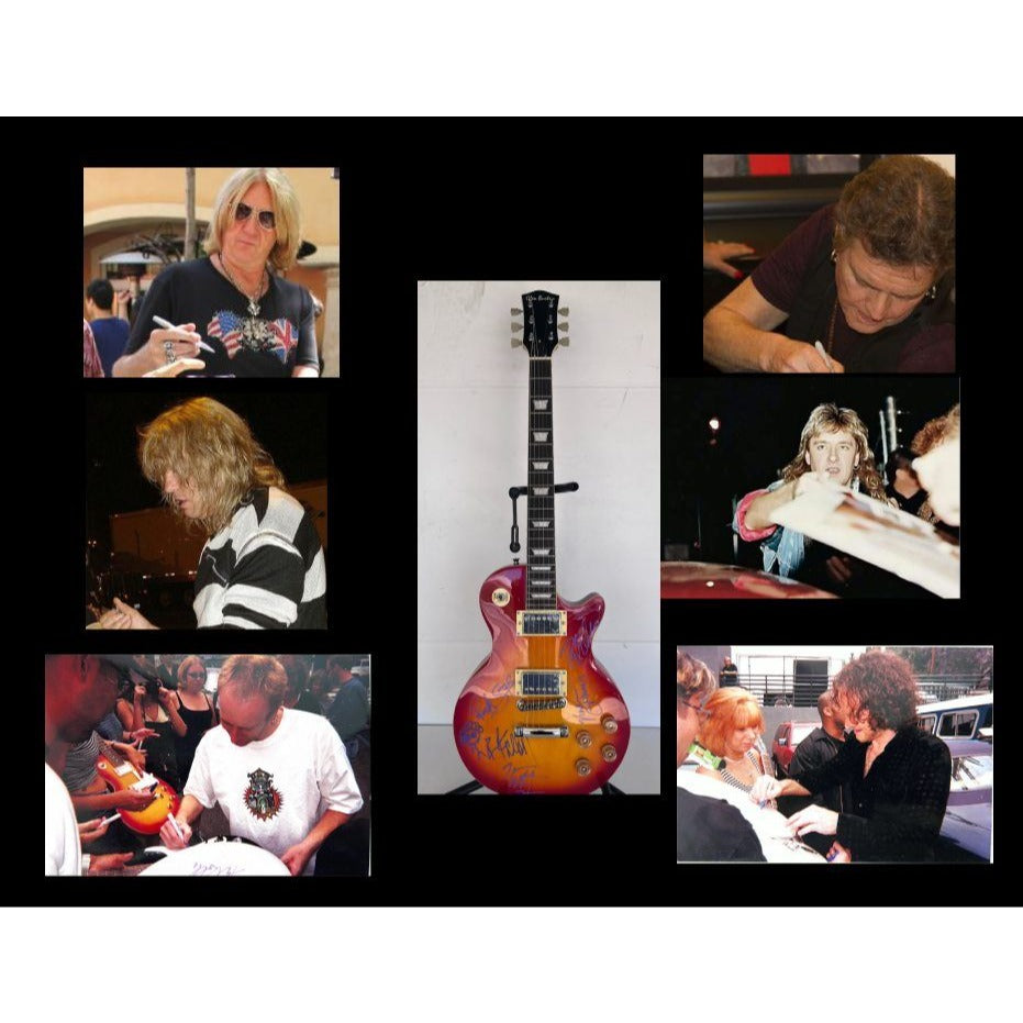 Def Leppard Joe Elliott, Rick Allen, Phil Collen, Rick Savage, Vivian Campbell, vintage cherry les paul full size electric guitar signed.