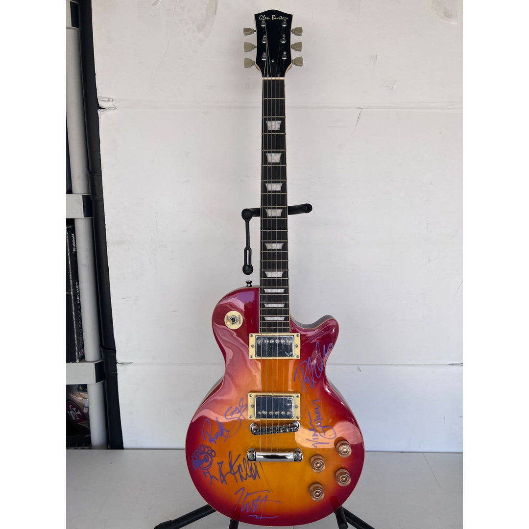 Def Leppard Joe Elliott, Rick Allen, Phil Collen, Rick Savage, Vivian Campbell, vintage cherry les paul full size electric guitar signed.