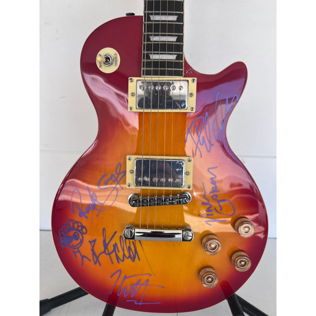 Def Leppard Joe Elliott, Rick Allen, Phil Collen, Rick Savage, Vivian Campbell, vintage cherry les paul full size electric guitar signed.