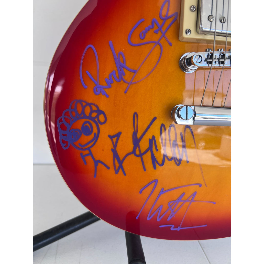 Def Leppard Joe Elliott, Rick Allen, Phil Collen, Rick Savage, Vivian Campbell, vintage cherry les paul full size electric guitar signed.
