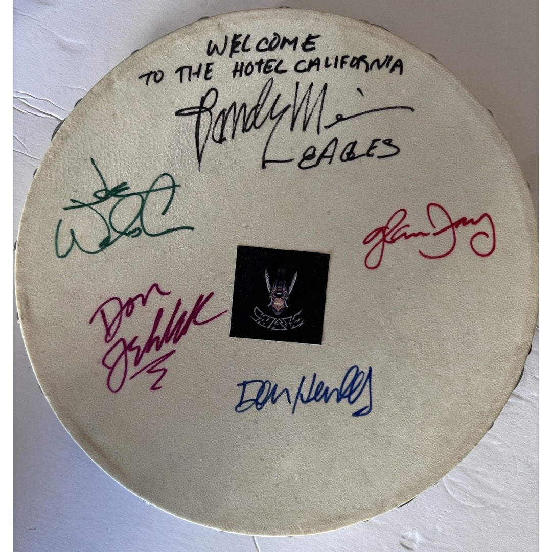 Don Henley, Joe Walsh, Glenn Frey, Randy Meisner, Don Felder, the Eagles 14-in tambourine signed with proof