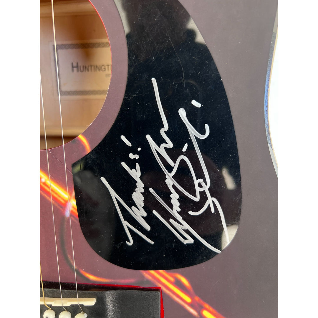 Waylon Jennings  one of a kind full size acoustic guitar signed with poof.