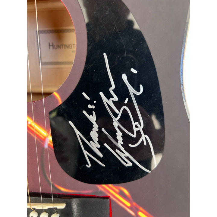 Waylon Jennings  one of a kind full size acoustic guitar signed with poof.