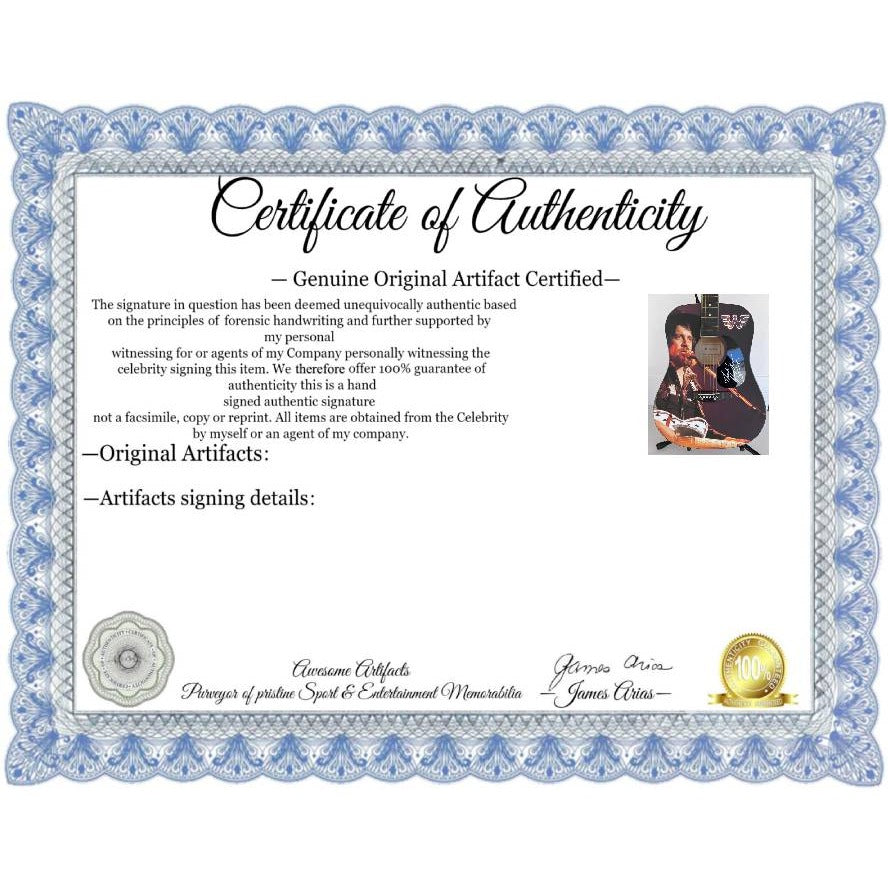 Waylon Jennings  one of a kind full size acoustic guitar signed with poof.