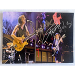 Load image into Gallery viewer, AC/DC Angus and Malcolm Young 5x7 photo signed with proof
