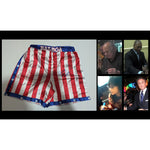 Load image into Gallery viewer, Rocky Balboa USA boxing shorts signed by the cast of Rocky including Sylvester Stallone Carl Weathers talliest shire Mr T Bert Young dolls l
