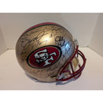 Load image into Gallery viewer, Joe Montana Jerry Rice Roger Craig Super Bowl champions full size riddell helmet signed with proof
