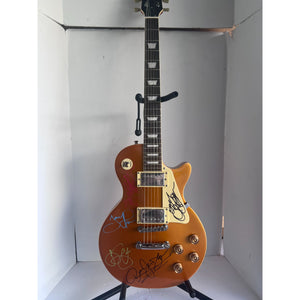 Ronnie James Dio, Ozzy Osbourne, Tony Iommi, Black Sabbath Les Paul style guitar signed with proof