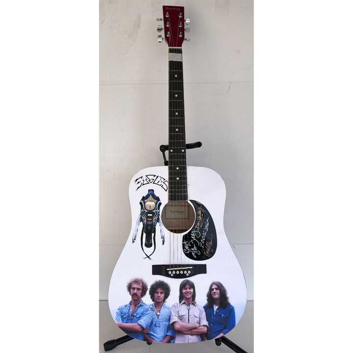 The Eagles Glen Frey, Don Henley, Randy Meisner, Bernie Leadon full size acoustic guitar (one of a kind ) signed with proof.