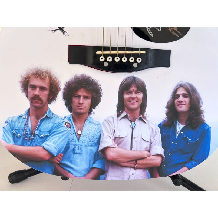 The Eagles Glen Frey, Don Henley, Randy Meisner, Bernie Leadon full size acoustic guitar (one of a kind ) signed with proof.