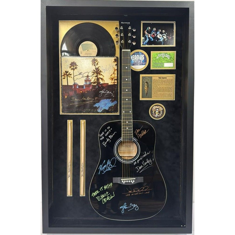 The Eagles Bernie Ladon Joe Walsh Don Henley Glenn Frey Randy Meisner Don Felder Vince Gill full size acoustic guitar signed and framed..