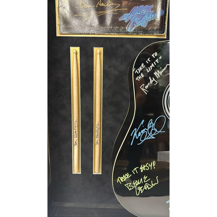The Eagles Bernie Ladon Joe Walsh Don Henley Glenn Frey Randy Meisner Don Felder Vince Gill full size acoustic guitar signed and framed..