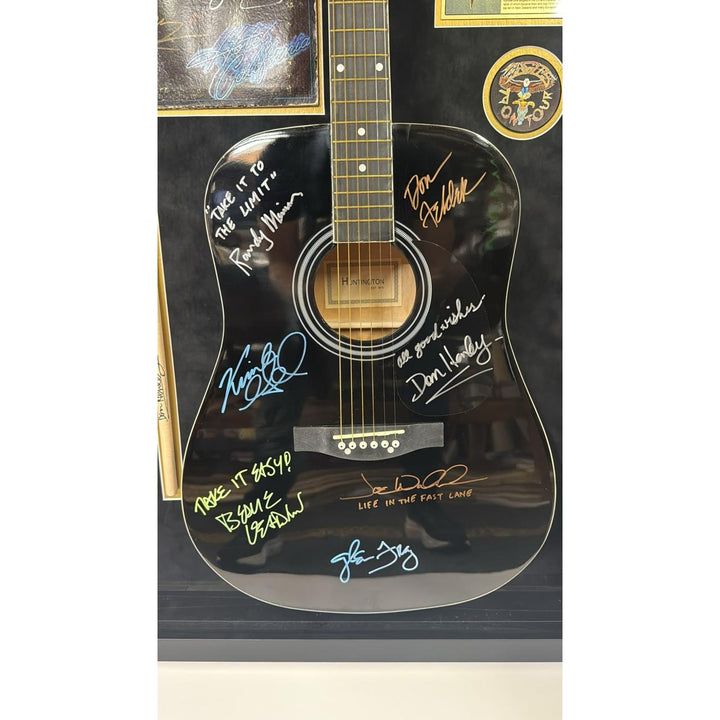 The Eagles Bernie Ladon Joe Walsh Don Henley Glenn Frey Randy Meisner Don Felder Vince Gill full size acoustic guitar signed and framed..
