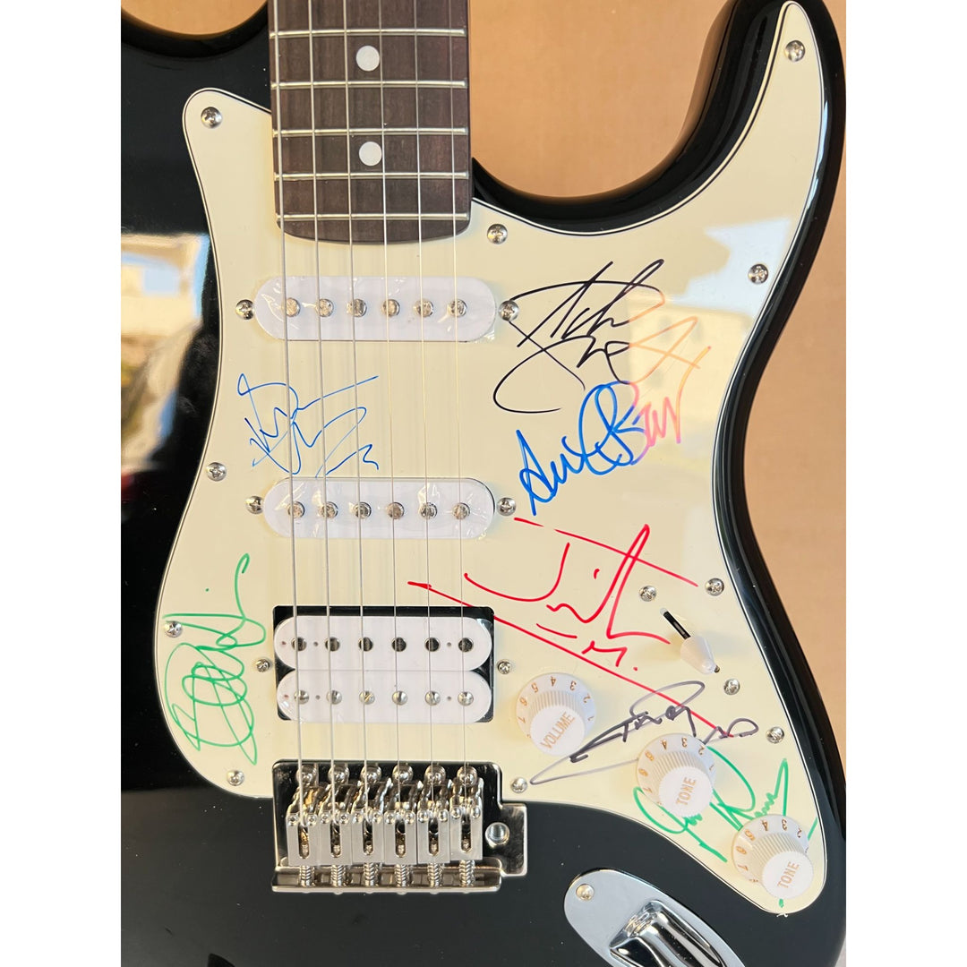 Iron Maiden full size Stratocaster electric guitar signed with proof