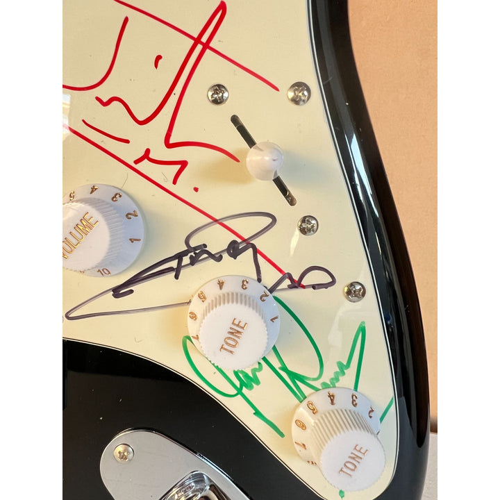 Iron Maiden full size Stratocaster electric guitar signed with proof