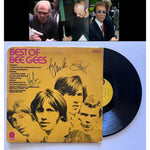 Load image into Gallery viewer, Barry, Robin and Maurice Gibb the Bee Gees Best of Bee Gees LP signed with proof
