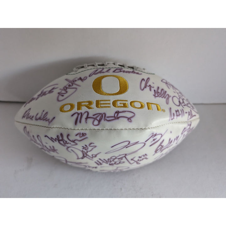 Oregon Ducks Dan Fouts Rich Brooks Chip Kelly Marcus Marriota all time greats signed football