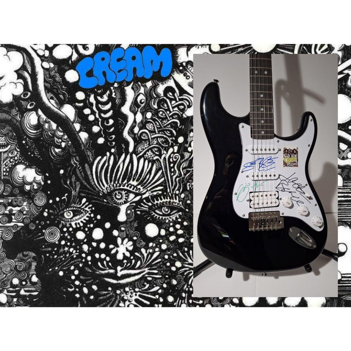 Eric Clapton, Ginger Baker, Jack Bruce, Cream, Fender Stratocaster electric guitar signed with proof