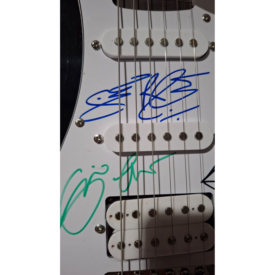 Eric Clapton, Ginger Baker, Jack Bruce, Cream, Fender Stratocaster electric guitar signed with proof