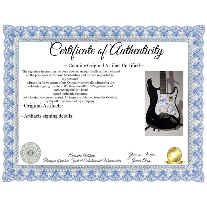 Eric Clapton, Ginger Baker, Jack Bruce, Cream, Fender Stratocaster electric guitar signed with proof