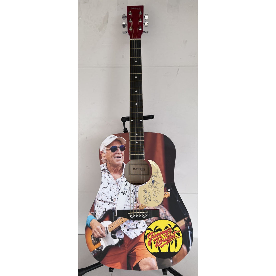 Jimmy Buffett full size acoustic guitar (one of a kind ) signed with proof.