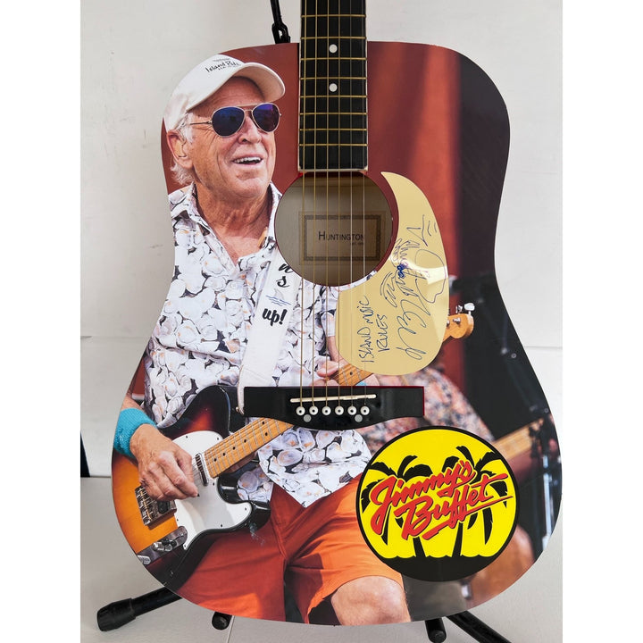 Jimmy Buffett full size acoustic guitar (one of a kind ) signed with proof.