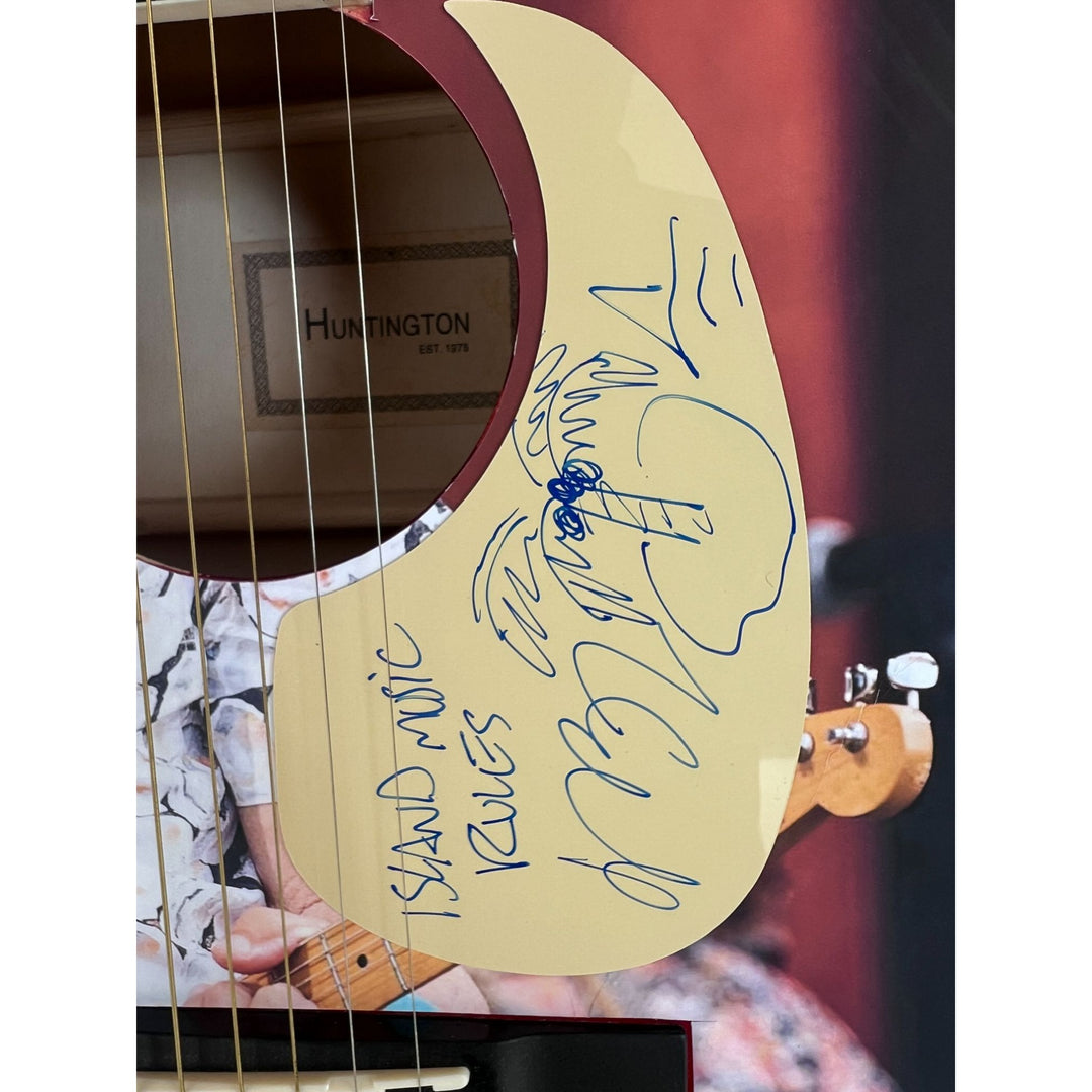 Jimmy Buffett full size acoustic guitar (one of a kind ) signed with proof.