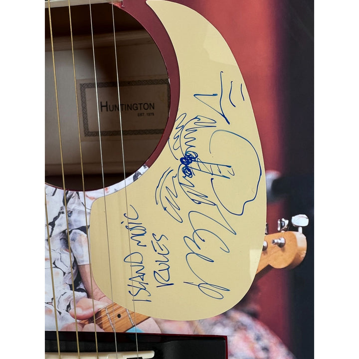 Jimmy Buffett full size acoustic guitar (one of a kind ) signed with proof.