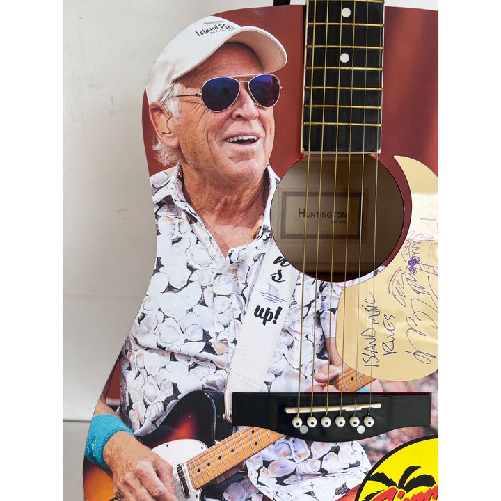 Jimmy Buffett full size acoustic guitar (one of a kind ) signed with proof.