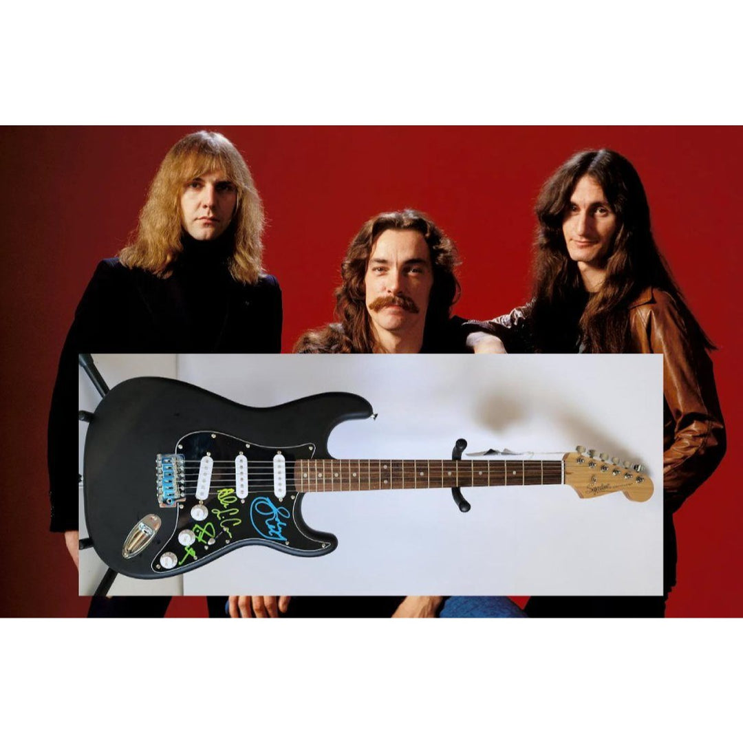 Rush Band signed Neil Peart, Geddy Lee, Alex Lifeson vintage black Fender Stratocaster full size electric guitar signed with proof