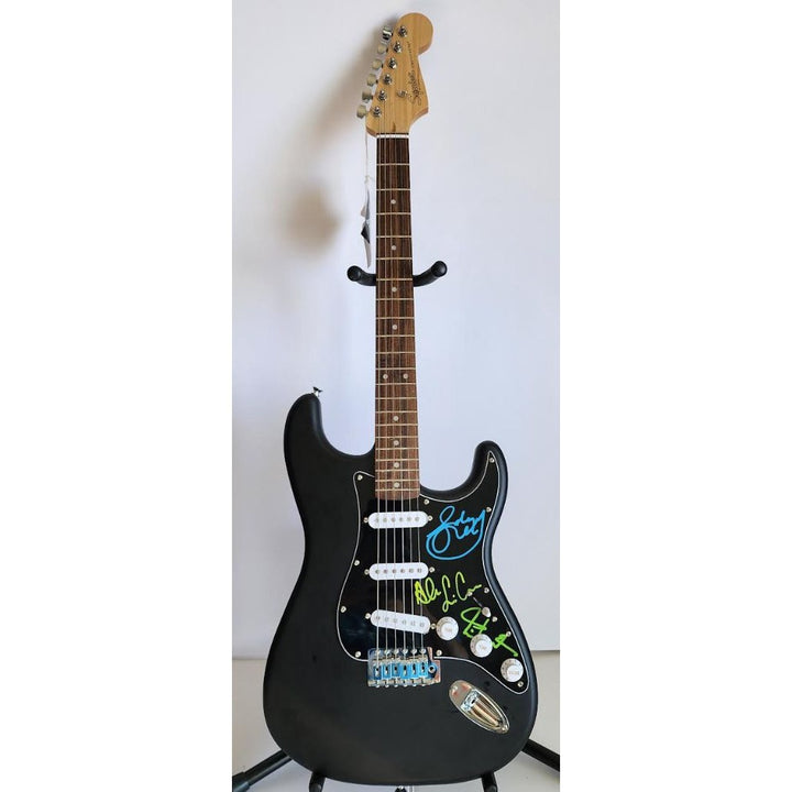 Rush Band signed Neil Peart, Geddy Lee, Alex Lifeson vintage black Fender Stratocaster full size electric guitar signed with proof