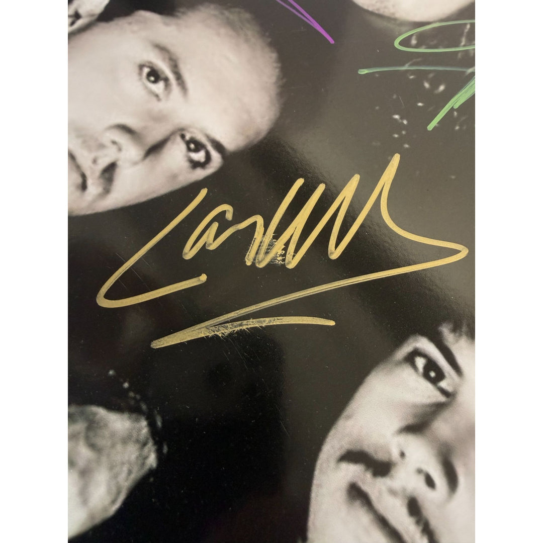 Metallica James Hetfield Lars Ulrich Kirk Hammett Jason Newsted  drumhead signed with proof.