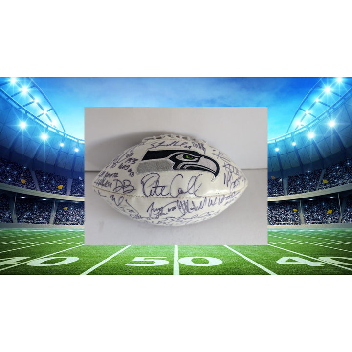 Seattle Seahawks Marshawn Lynch Pete Carroll Russell Wilson Richard Sherman Super Bowl champions team signed football