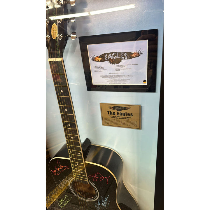 The Eagles Bernie Laden Joe Walsh Don Henley Glenn Frey Randy Meisner signed and framed full size acoustic guitar with proof