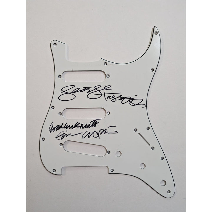 George Harrison and Eric Clapton Fender Stratocaster electric guitar pickguard signed with proof