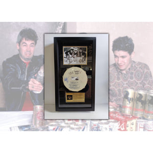 The Beastie Boys, 'Mike D' Diamond, Adam 'MCA' Yauch, Adam 'Ad-Rock' Horovitz tambourine signed & framed with proof