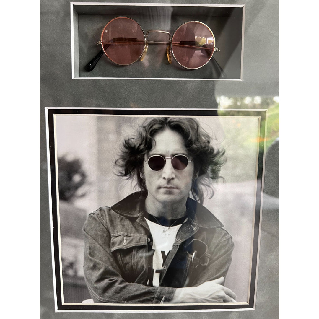 John Lennon The Beatles Co-Vocalist , Song Writer, and lead rhythm guitarist autograph book page signed with sketch & framed with proof