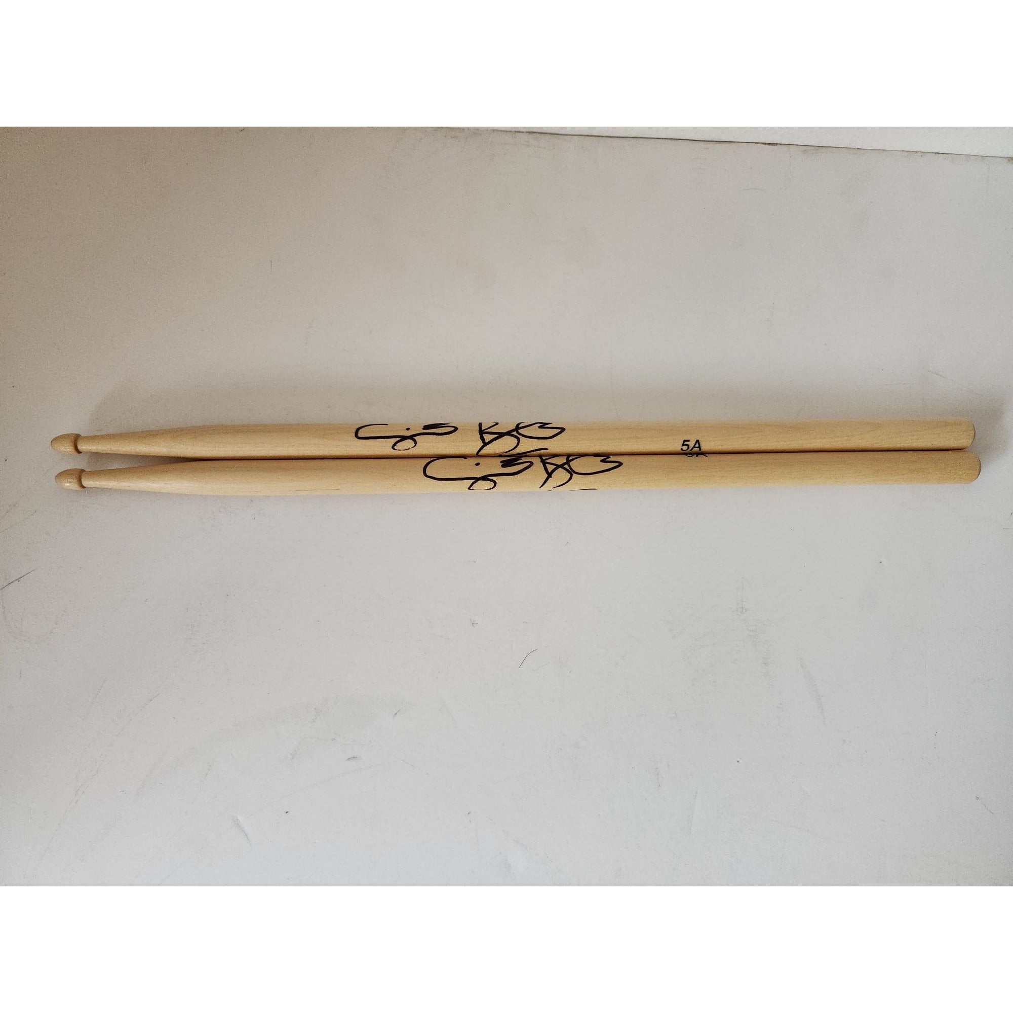 Ginger Baker of Cream Drumstick signed with proof