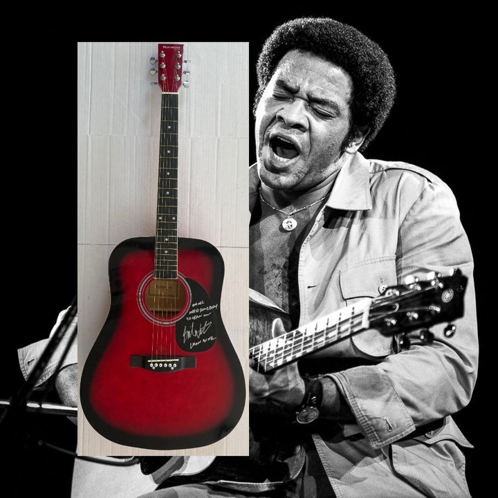 Bill Withers full size acoustic guitar signed with lyrics.