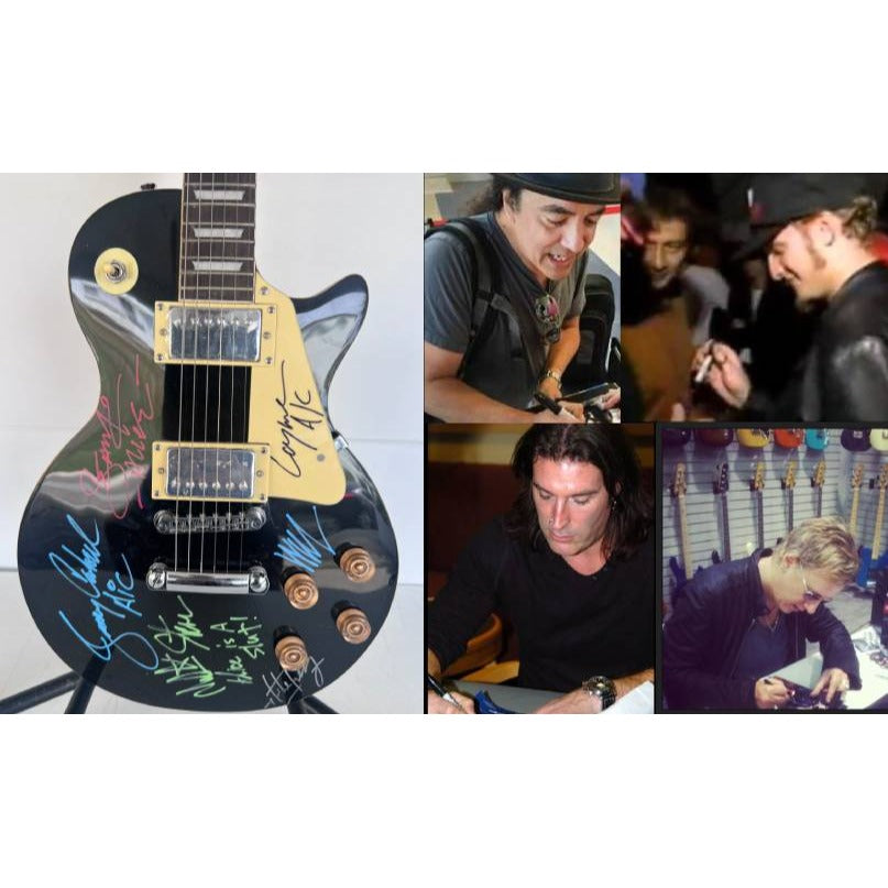 Alice in Chains Hand signed by Layne Staley, Jerry Cantrell, Mike Starr, and Sean Kinney vintage les paul electric guitar signed with proof.