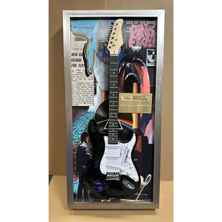 21x44 framed Pink Floyd Roger Waters David Gilmour Richard Wright Nick Mason vintage black les paul electric guitar signed with proof.
