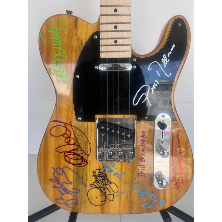 Gregg Allman, Dickey Betts, Wayne Haynes, The Allman Brothers Telecaster electric guitar signed with proof.