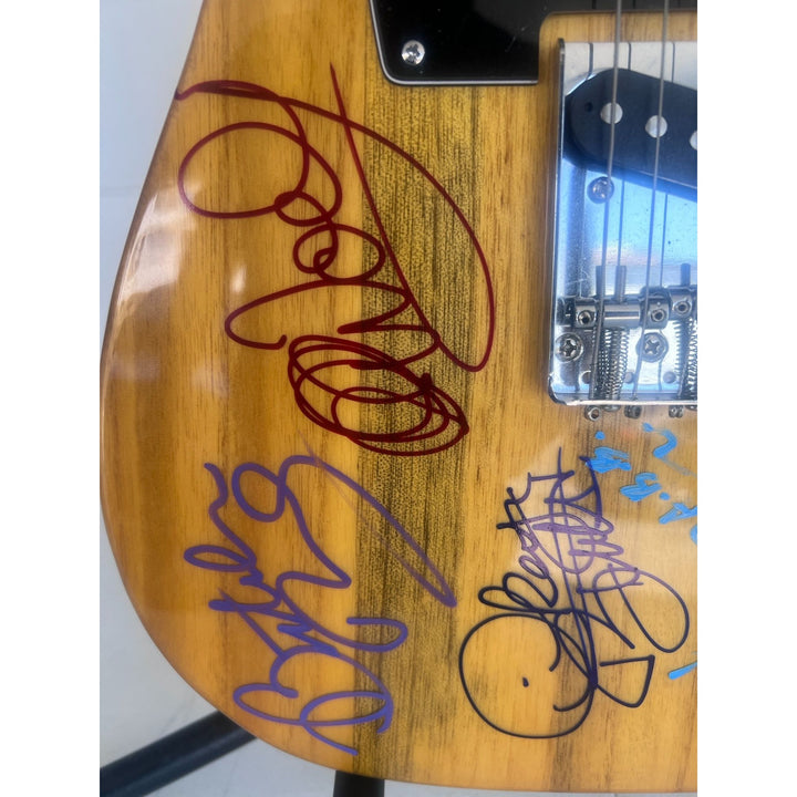 Gregg Allman, Dickey Betts, Wayne Haynes, The Allman Brothers Telecaster electric guitar signed with proof.